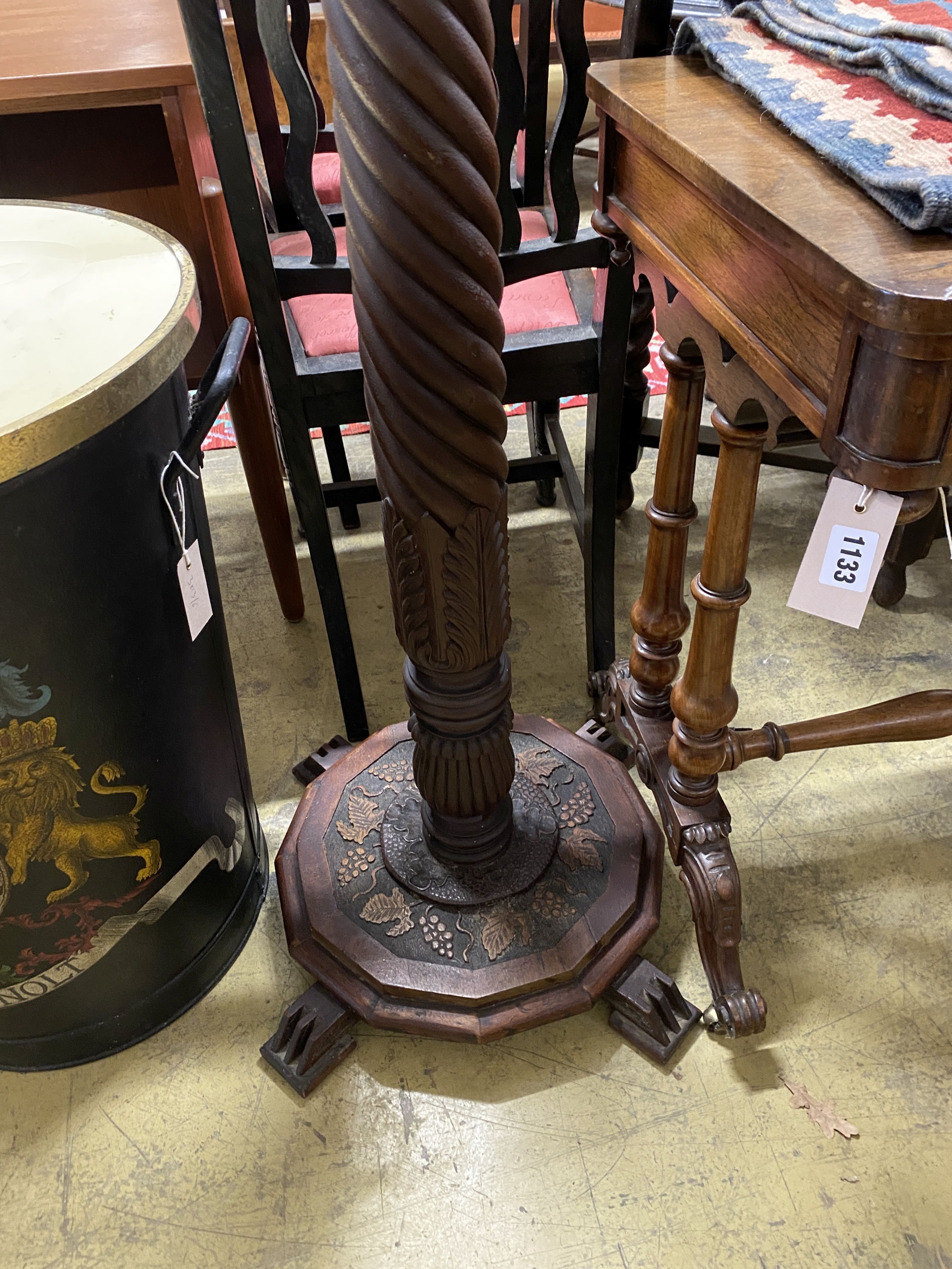 A carved mahogany pedestal, width 36cm, height 127cm